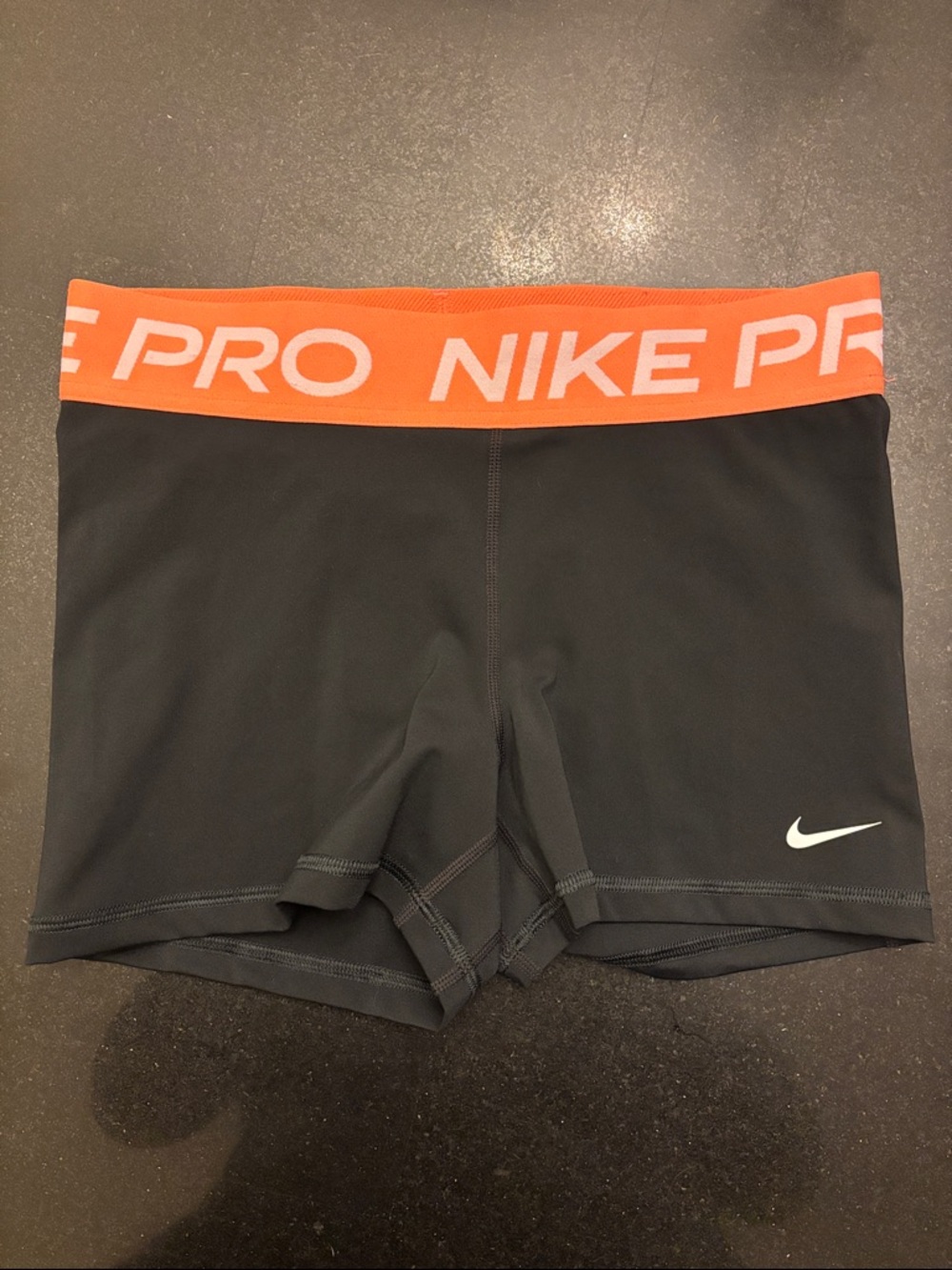 Nike Pro Women's Black Bike Shorts with Orange Logo Waistband
